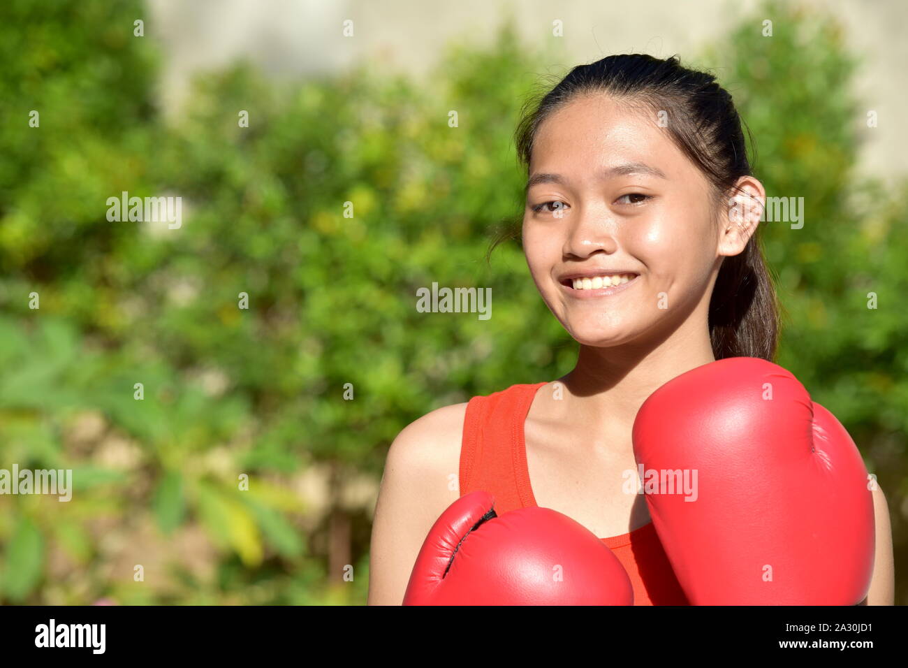 A Happy Female Boxer Athlete Stock Photo