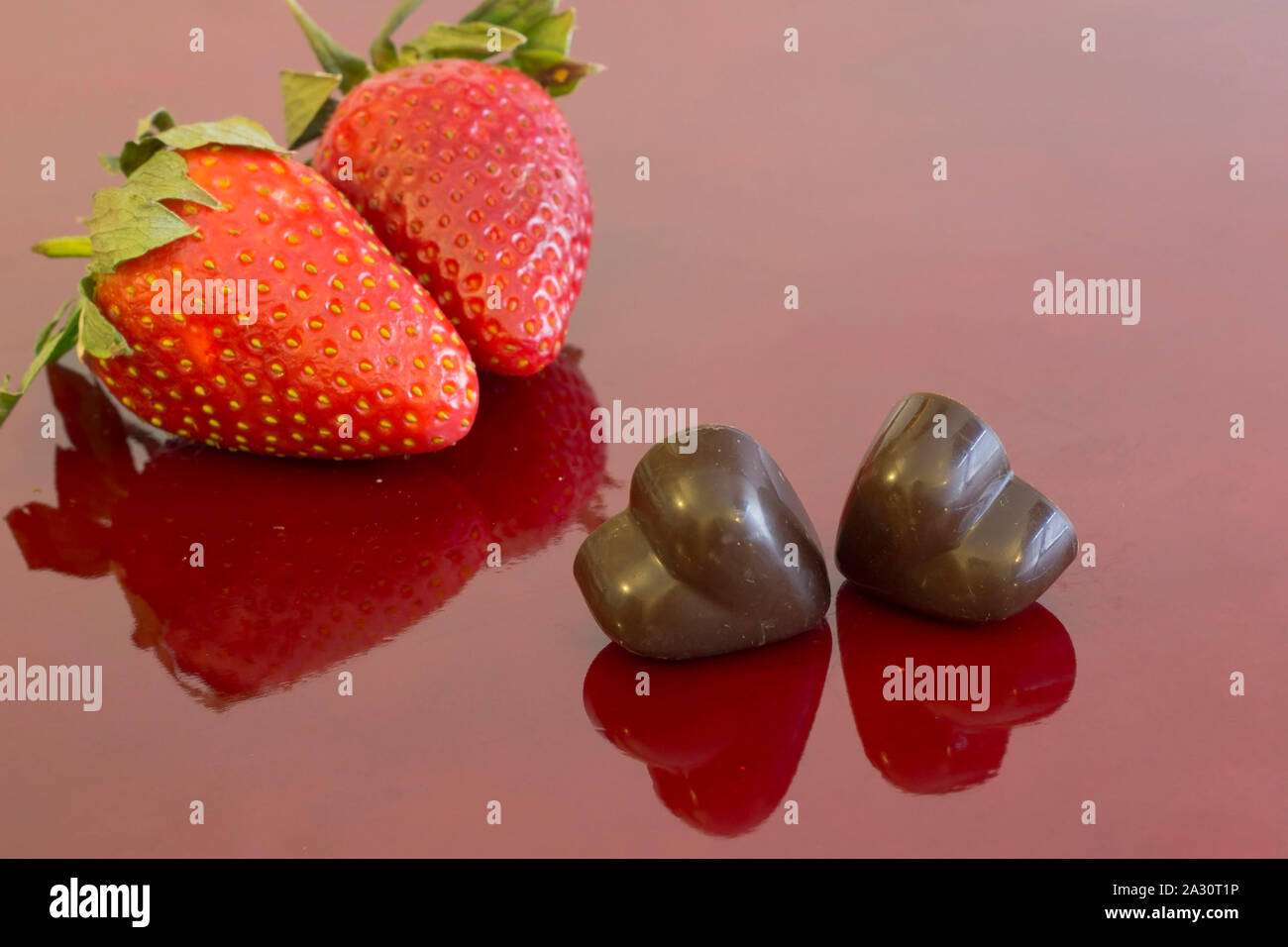 Chocolate hearts and strawberry Stock Photo