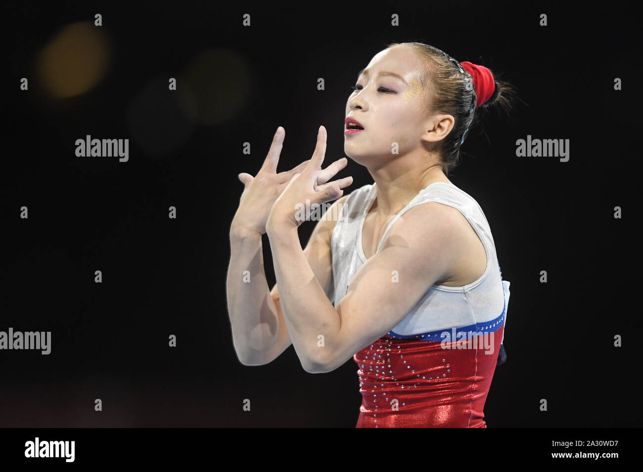 Stuttgart, Germany. 4th Oct, 2019. SU JONG KIM from North Korea performs her floor routine during the qualification round in the Hanns-Martin-Schleyer-Halle in Stuttgart, Germany. Credit: Amy Sanderson/ZUMA Wire/Alamy Live News Stock Photo