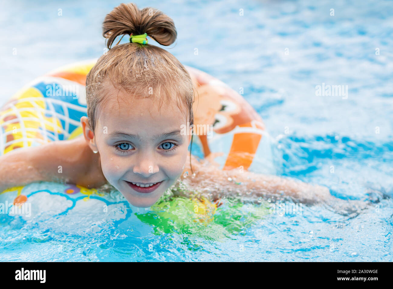 child floats on an inflatable ring Stock Photo Alamy