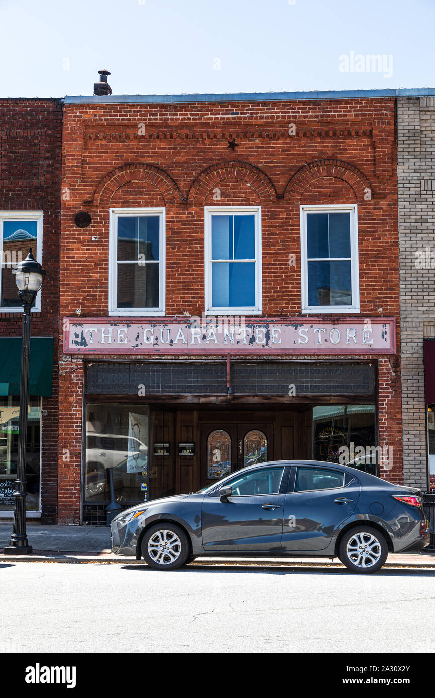 LENOIR, NC, USA-24 SEPT 2019: Old mercantile store in downtown still has the sign reading 'The Guarantee Store' over the entrance. Stock Photo