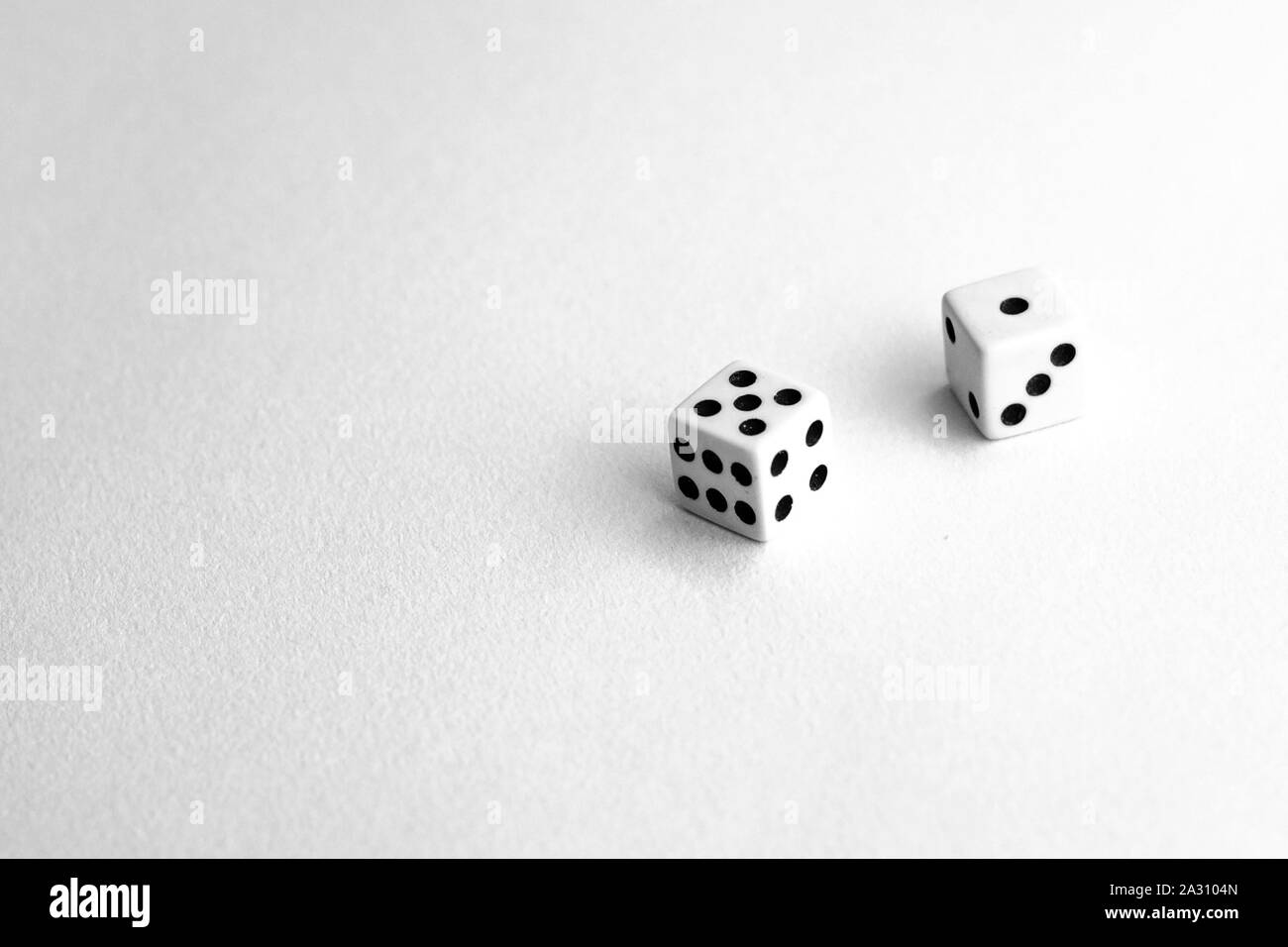 Game dice isolated on white background. Casino gambling. Stock Photo