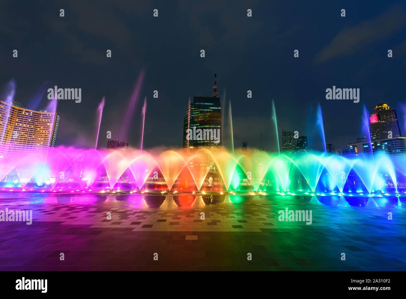the fountain showing with lighting in night time Stock Photo - Alamy