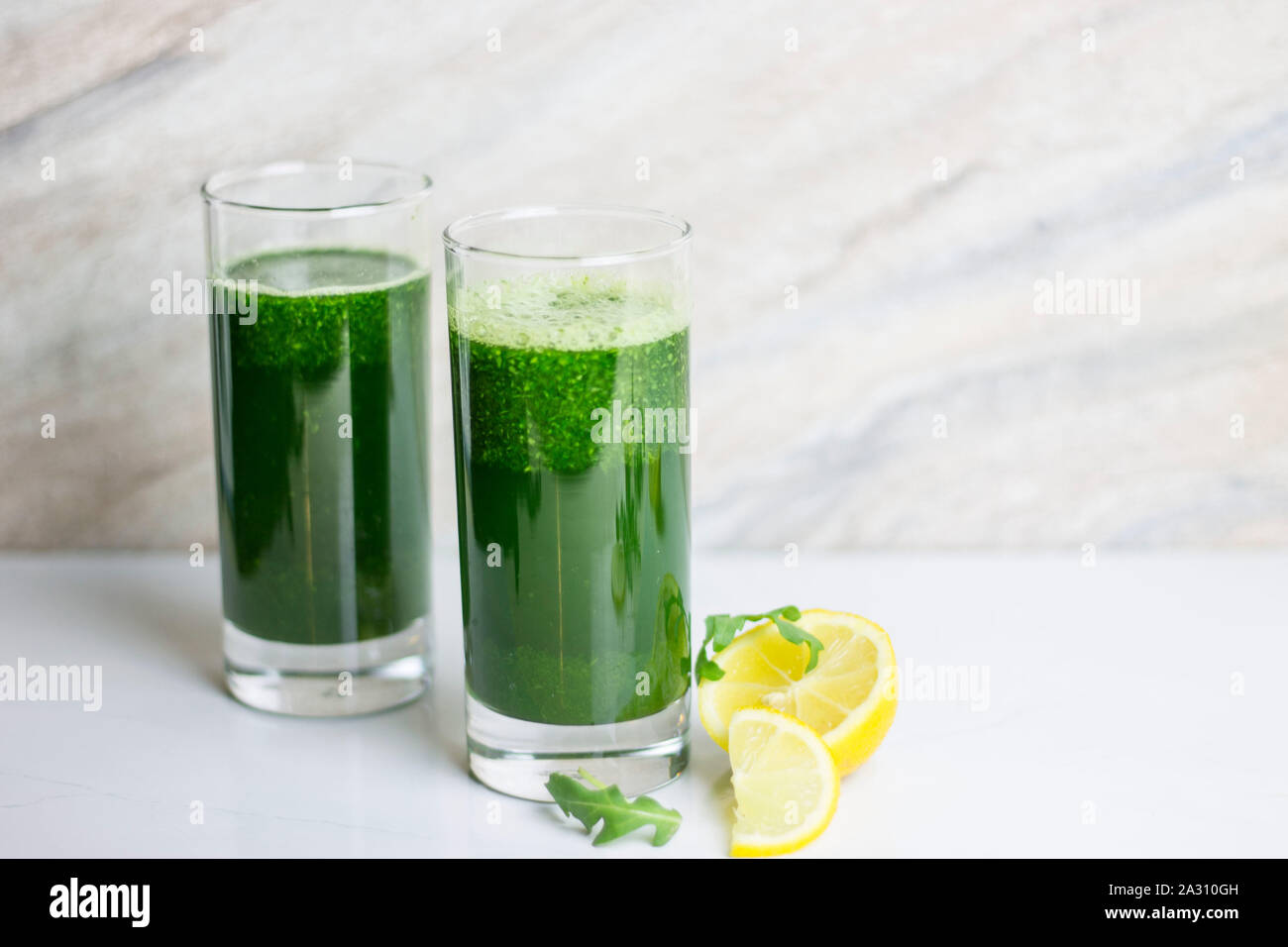 Green parsley juice with lemon. Healthy eating concept Stock Photo Alamy