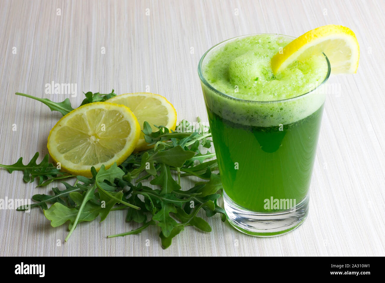 Green detox juice. Wild rocket, parsley and lemon Stock Photo Alamy