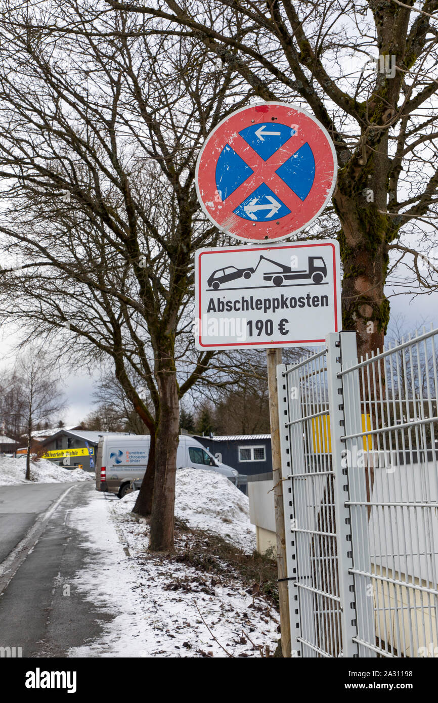 No stopping sign and warning of towing costs, in Winterberg, Sauerland, Germany Stock Photo