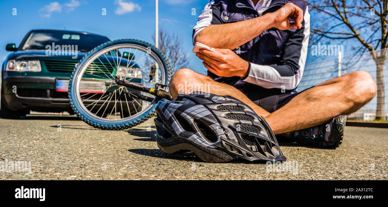 Bicycle accident injury Stock Photo - Alamy