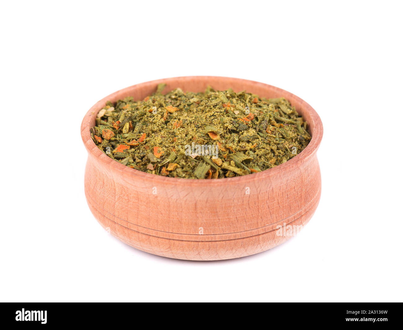 Mixed Italian Herbs Seasoning in a wooden bowl isolated on white