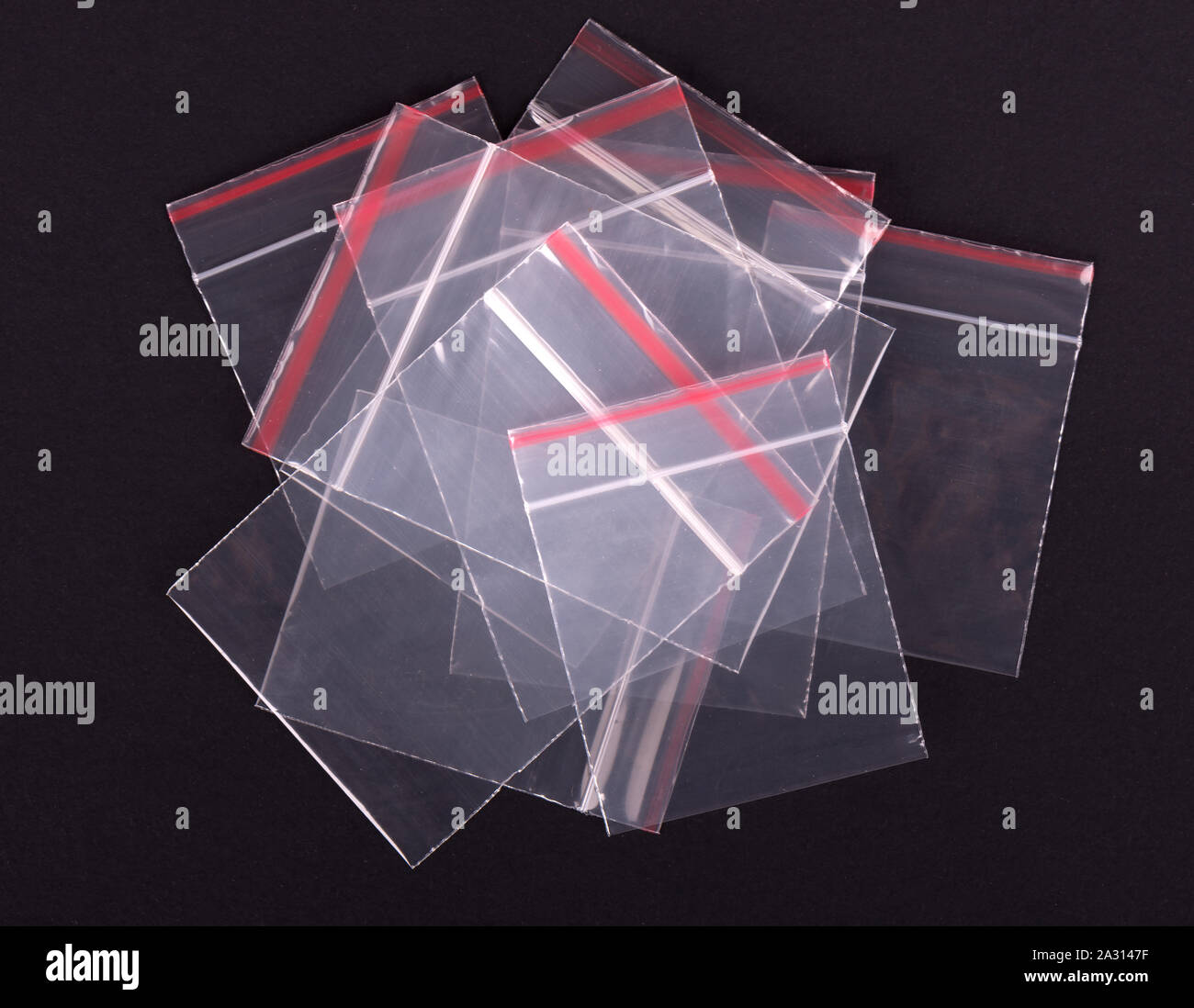 Blank black and white full loop handle plastic bag mockup, 3d endering.  Empty crumpled poly parcel mock up, top view, isolated. Clear cary wrapping  fo Stock Photo - Alamy