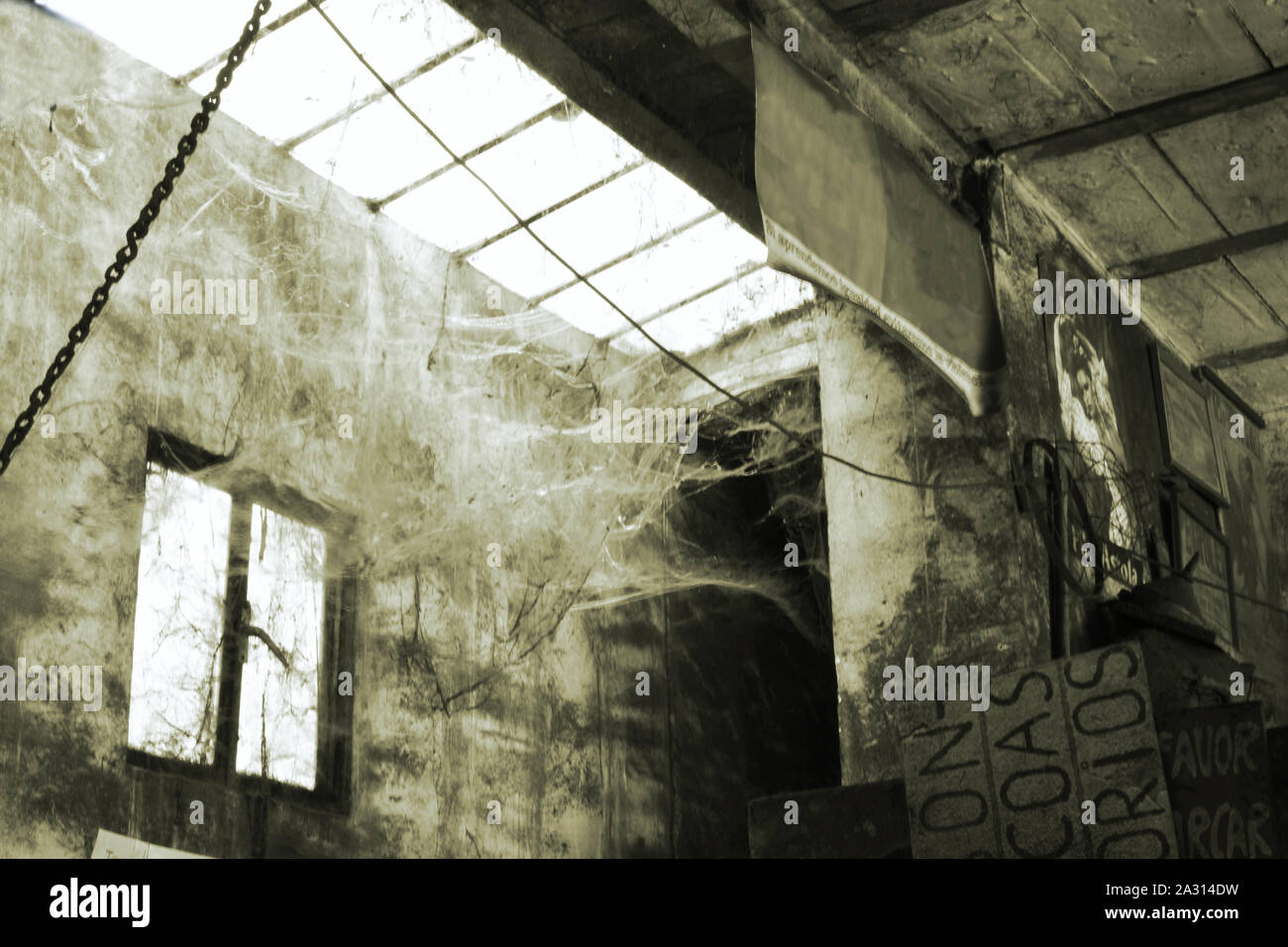 an ancient mechanical workshop full of cobwebs Stock Photo