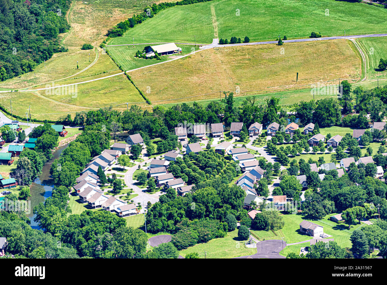 Horizontal Aerial Image Showing Urban Sprawl As New Homes Overrun Farm Land Stock Photo