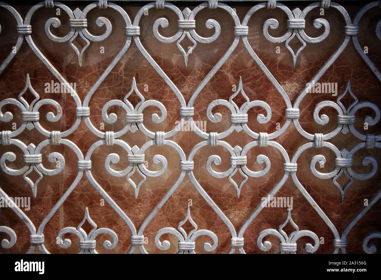 Venetian ornate window grille with heart design. Stock Photo