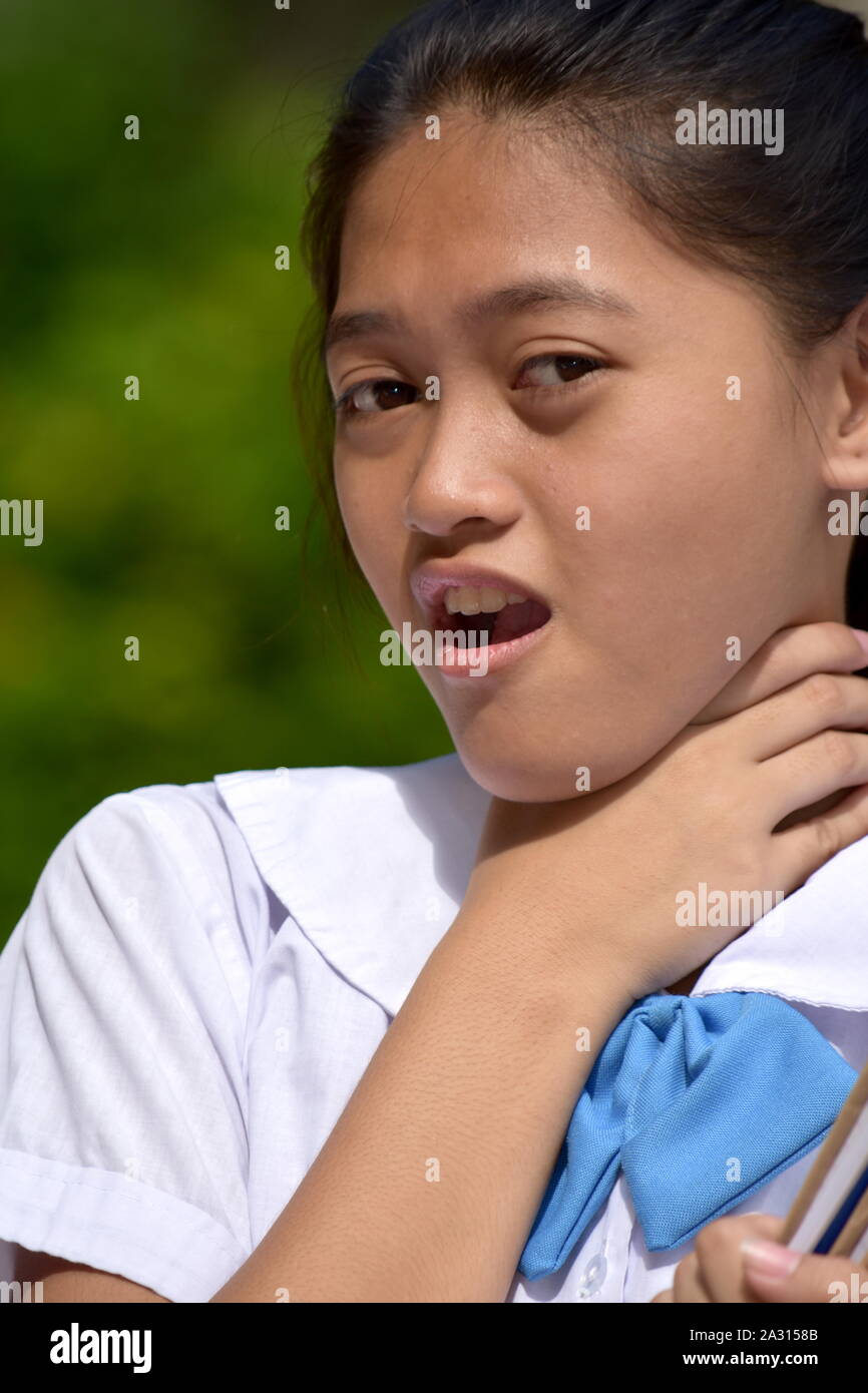 Youthful Female Student Choking With School Books Stock Photo Alamy