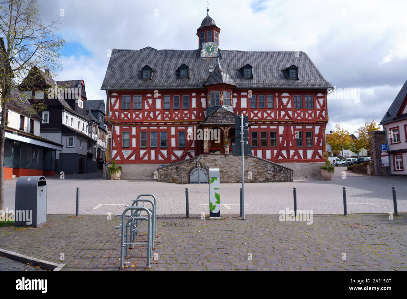 The ornate facade of the old town hall in Hadamar, a listed half-timbered house. Stock Photo