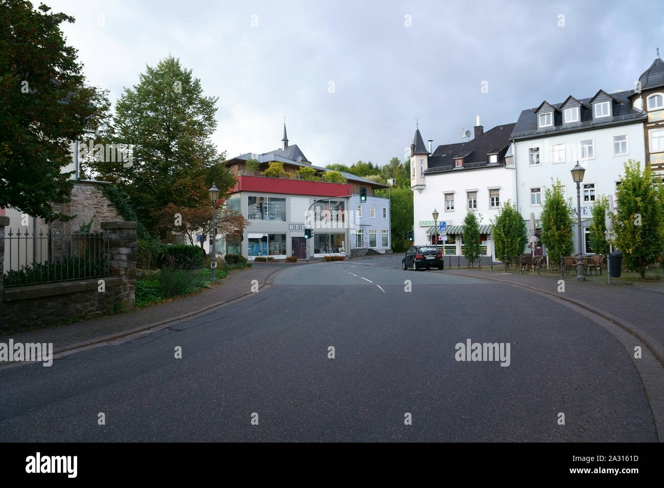 Hadamar, Germany - September 28, 2019: A street turn with restaurants and shops on September 28, 2019 in Hadamar. Stock Photo