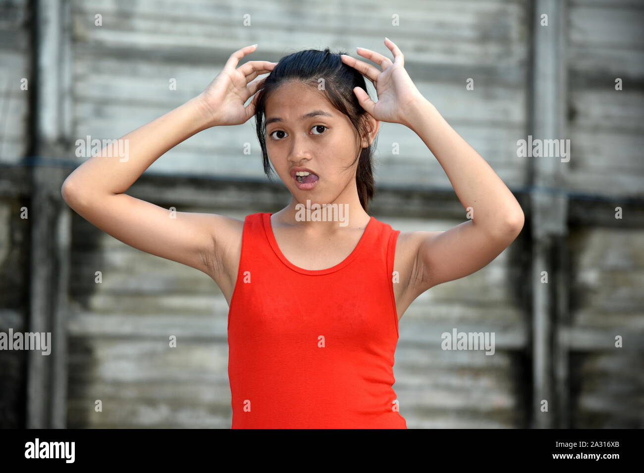 Teen asian confused hi-res stock photography and images - Alamy