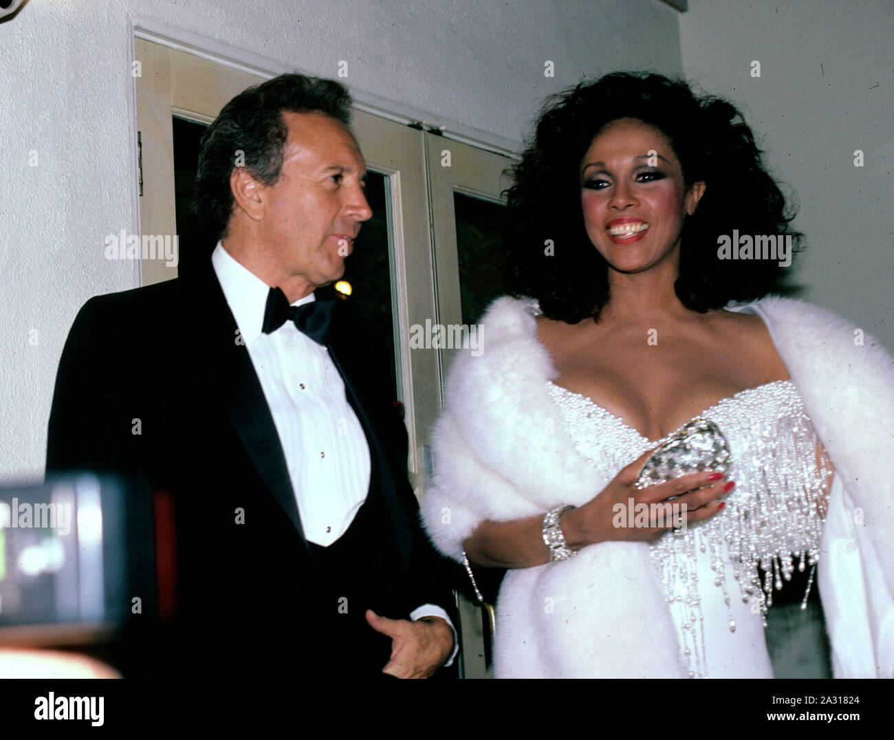 ***FILE PHOTO*** Diahann Carroll Has Passed Away At 84. Diahann Carroll and Vic Damone in Los Angeles, California in 1986. Credit: Walter McBride/MediaPunch Stock Photo
