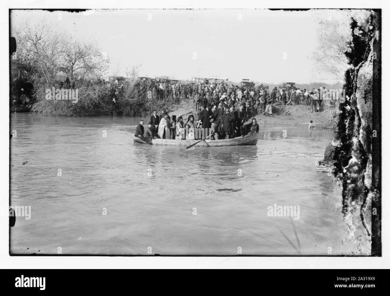 Epiphany ceremony. Jordan River. Sanctifying the waters of the Jordan on Ephphany Stock Photo