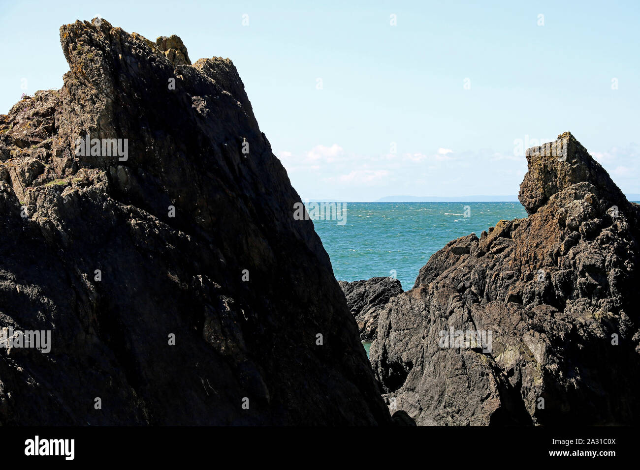 Rock formations and sea view in a coastal location Stock Photo - Alamy