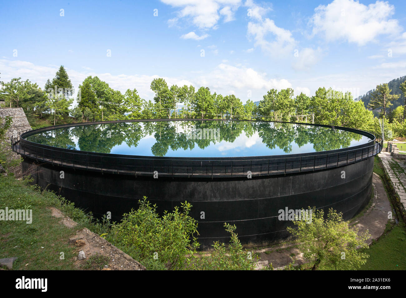 Water Storage Tank for the community of Ayubia, Donga Gali, Pakistan. Stock Photo