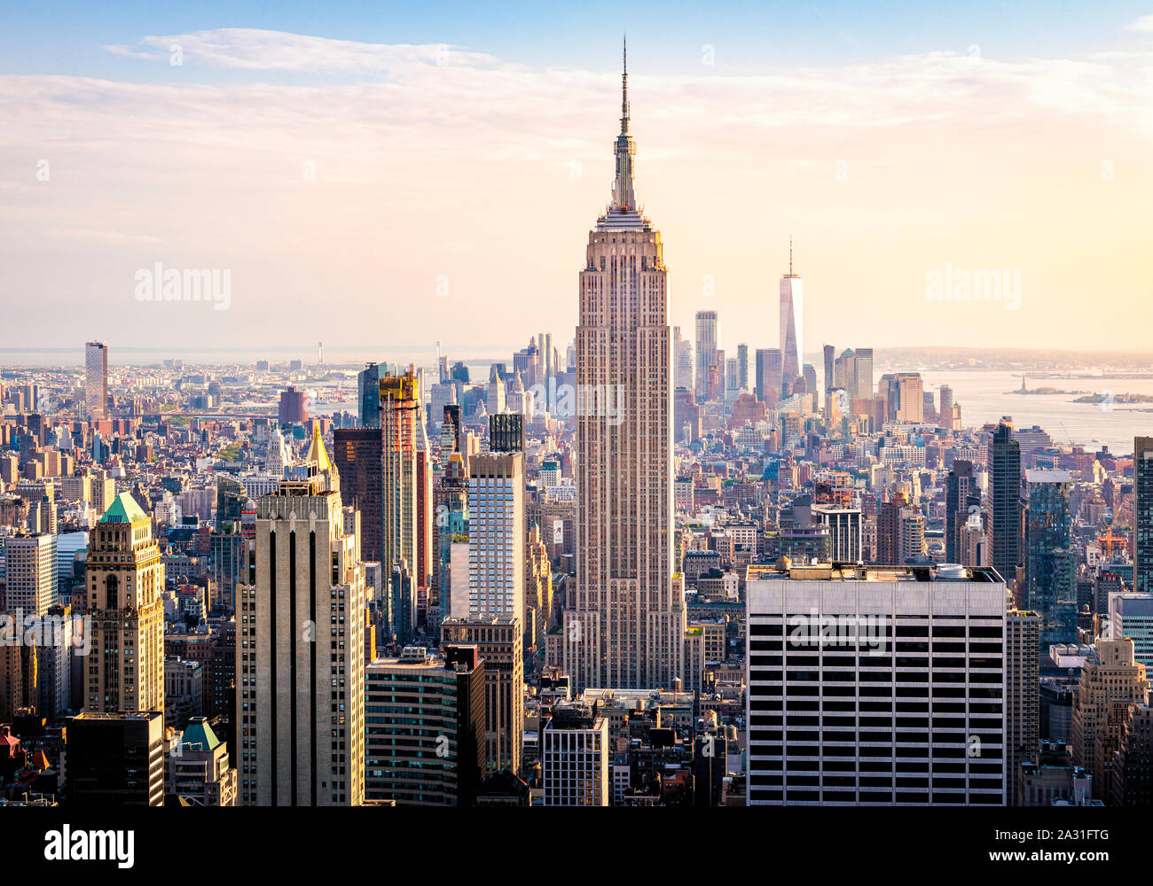 The New York City skyline including the Empire State Building, One World Trade Center and the Hudson River, USA. Stock Photo