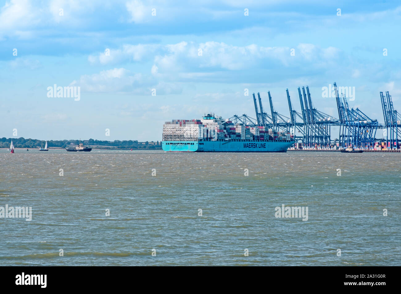 A container ship leaving Felixstowe laden with containers Stock Photo