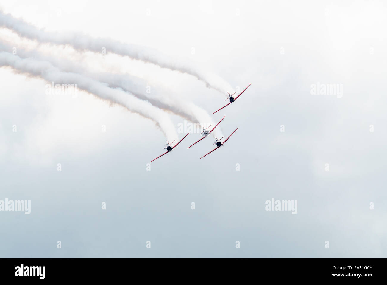 Planes performing acrobatic flight at air show Stock Photo Alamy