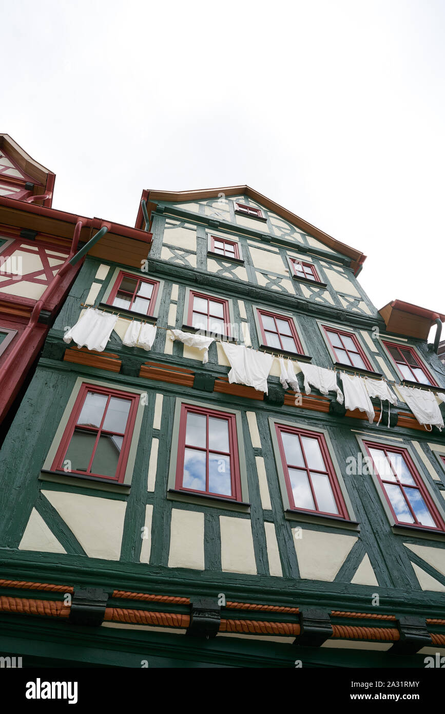 Clothesline on a half-timbered house in the historic old town of Schmalkalden in Thuringia in Germany Stock Photo