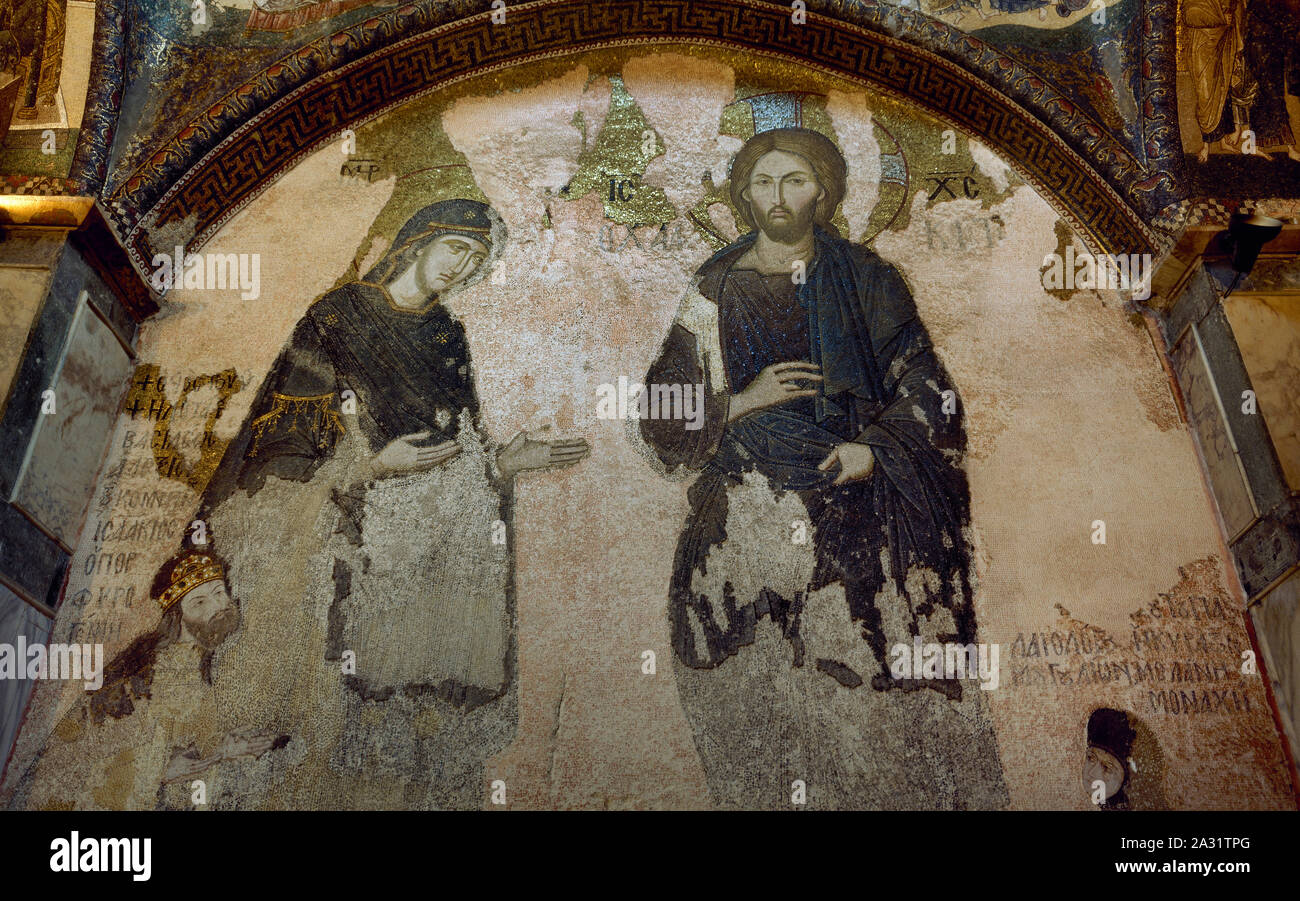 Chora Church. Medieval Byzantine Greek Orthodox church. Mosaics of the Esonarthex. Deesis, Christ and the Virgin Mary (without John the Baptist) with two donors below (Stepsister of Andronikos II, wearing nun clothes and Isaak Komnemos, son of Alexios I) Istanbul, Turkey. Stock Photo