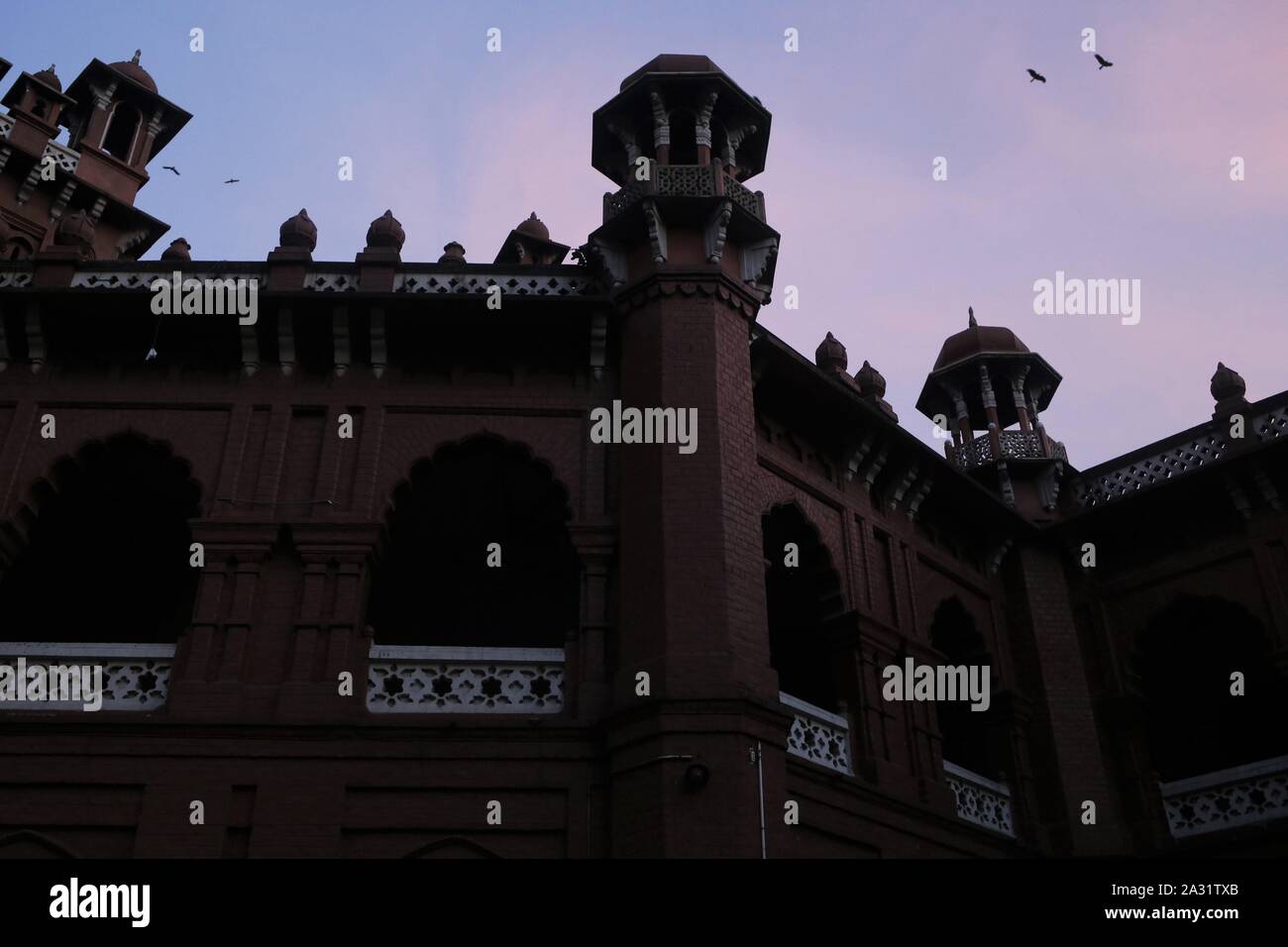 Dhaka, Bangladesh. 5th Oct, 2019. A front view of Curzon hall during the sunset, a British Raj-era building and now home of the Faculty of Science of Dhaka University. Credit: MD Mehedi Hasan/ZUMA Wire/Alamy Live News Stock Photo