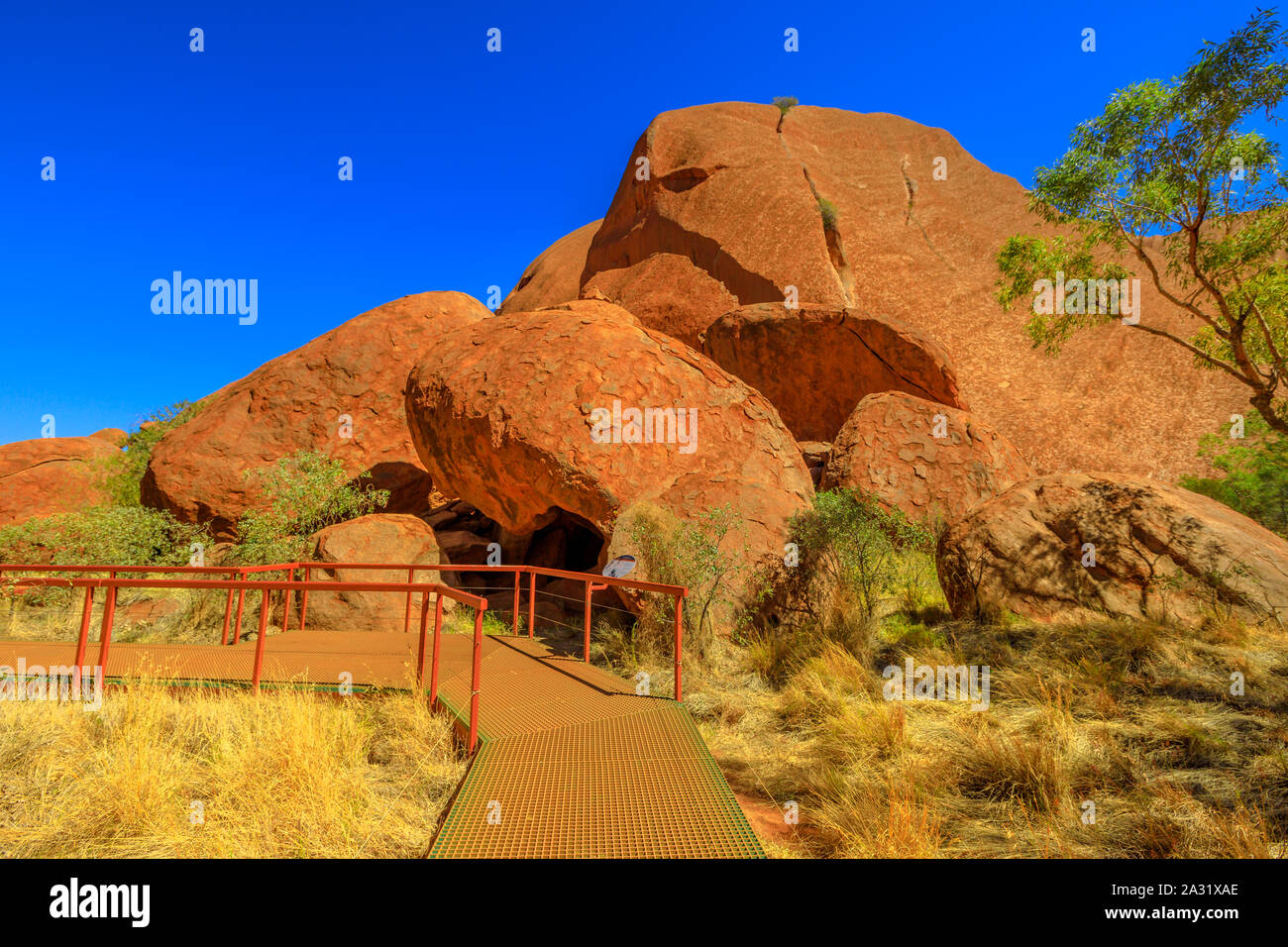 Walkway to aboriginal cave along Kuniya Walk in UluruKata Tjuta