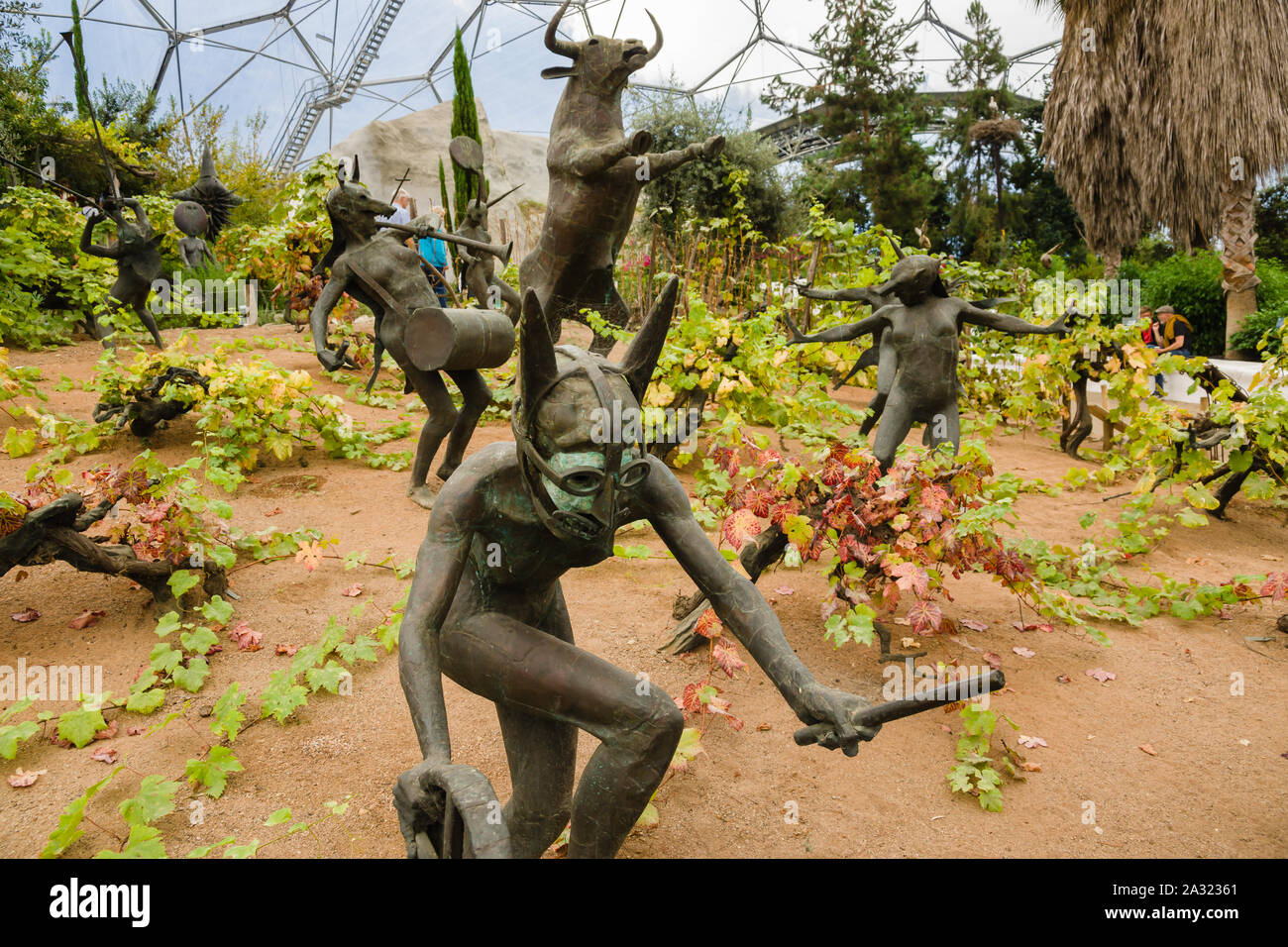 The Rites of Dionysus sculpture of the Maenads and bull by the artist Tim Shaw in the Eden Project Mediterranean biome Cornwall Stock Photo