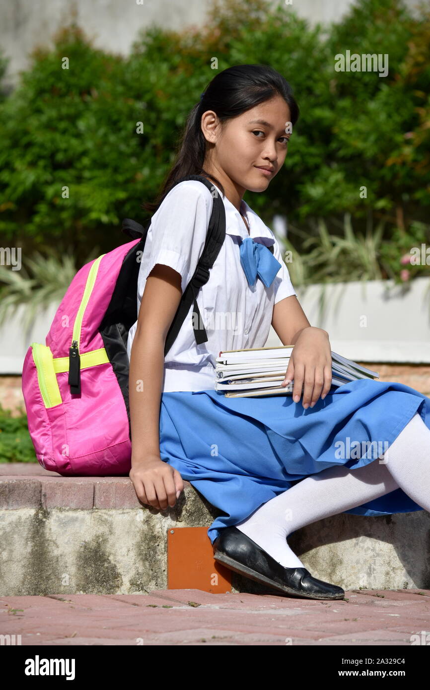 Asian college girl sitting hi-res stock photography and images - Alamy