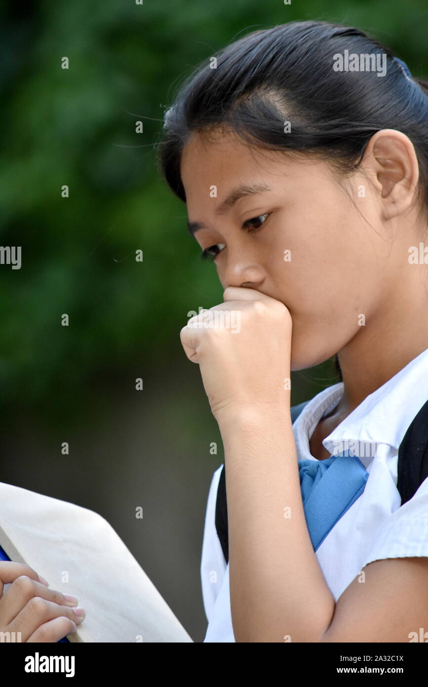 A Girl Student And Illness Stock Photo