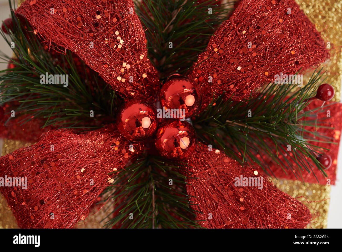 Red christmas ribbon with tree fir. Merry xmas decoration Stock Photo