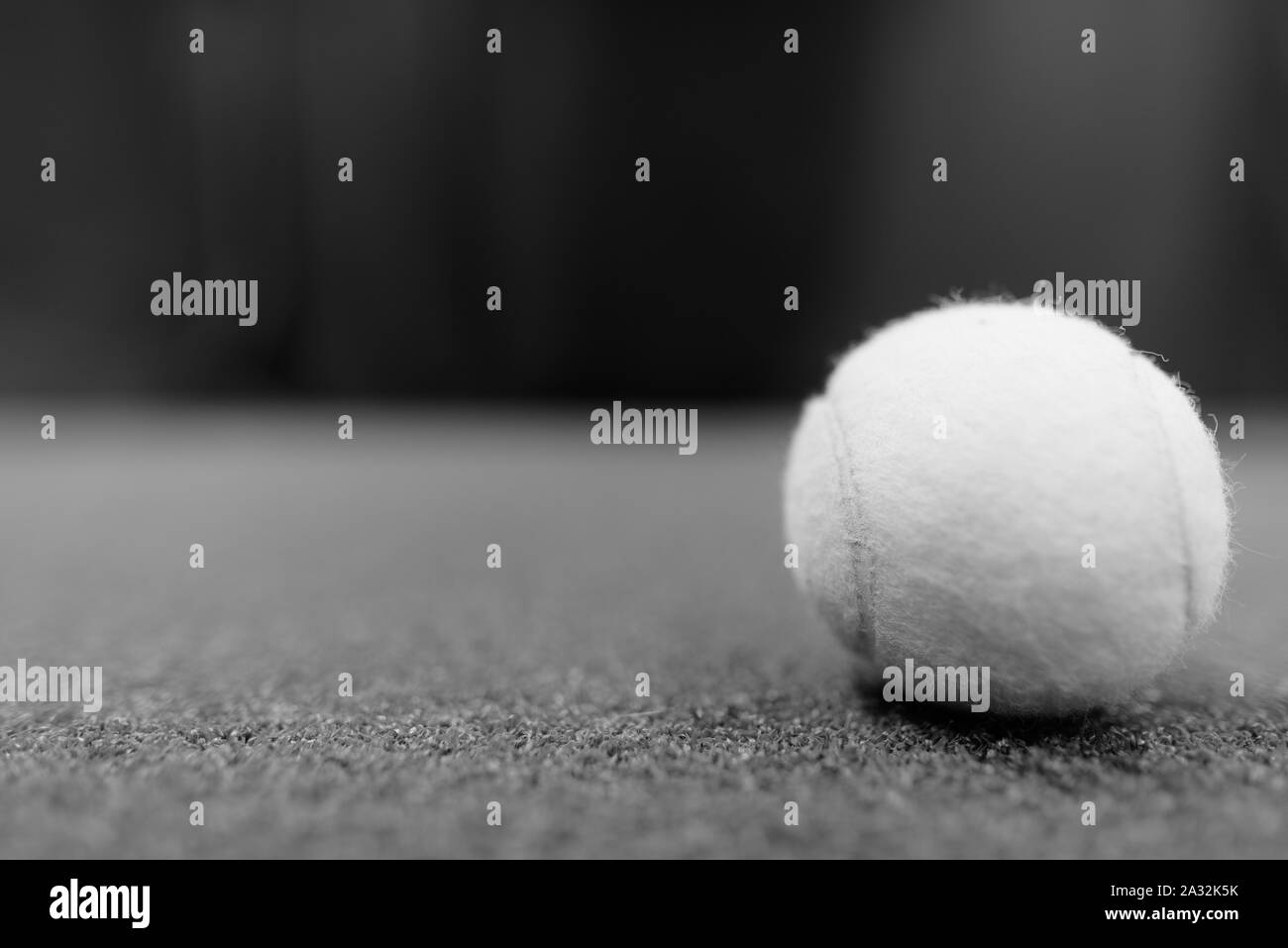 Tennis Balls On Ground Shot in Black And White Stock Photo