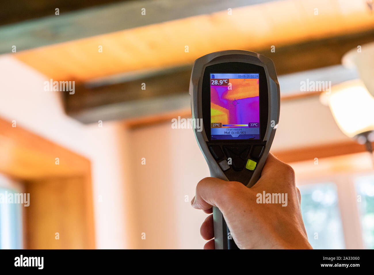 An infrared thermal imaging device is seen in use, close up during an