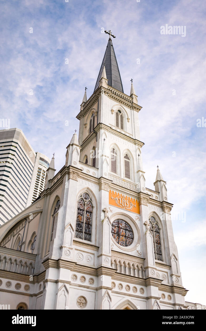 Singapore, 13 Jan 2015: Historical church landmark Chijmes with blue sky. Stock Photo