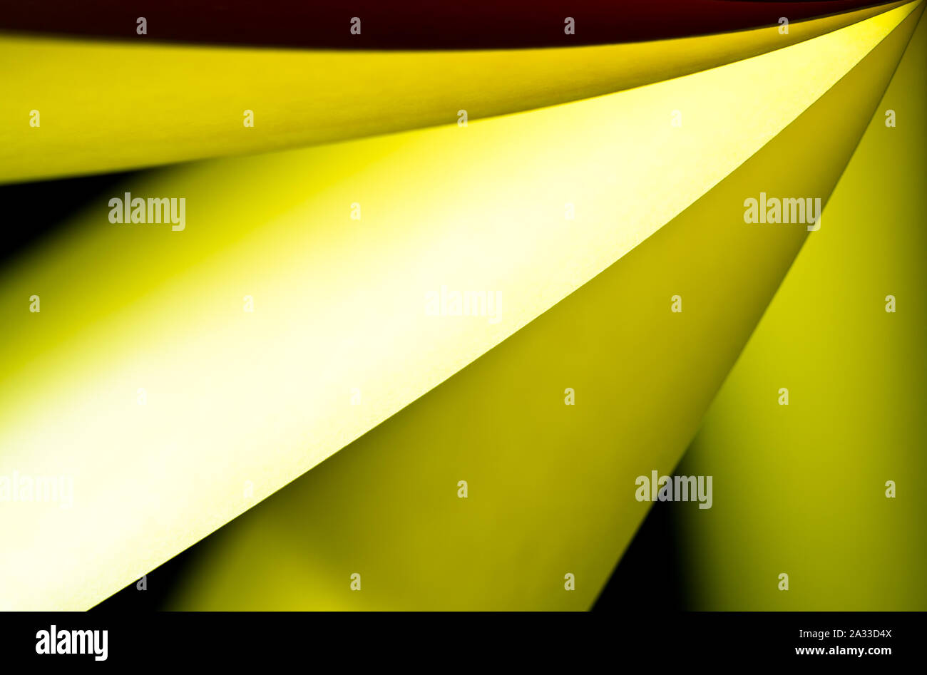 bright yellow colored illuminated notepad in various position and ...