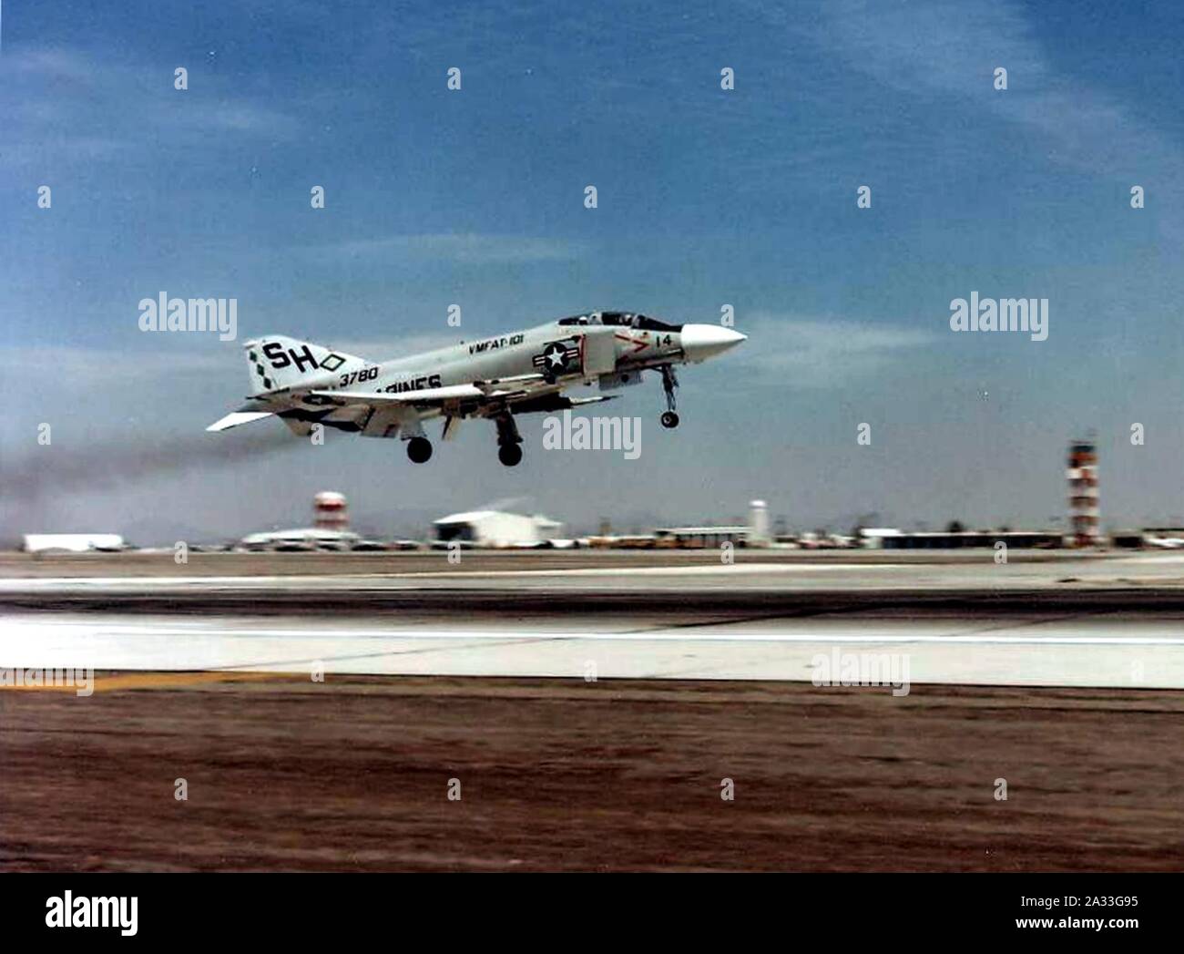 F-4J of VMFAT-101 landing at MCAS Yuma in 1977. Stock Photo