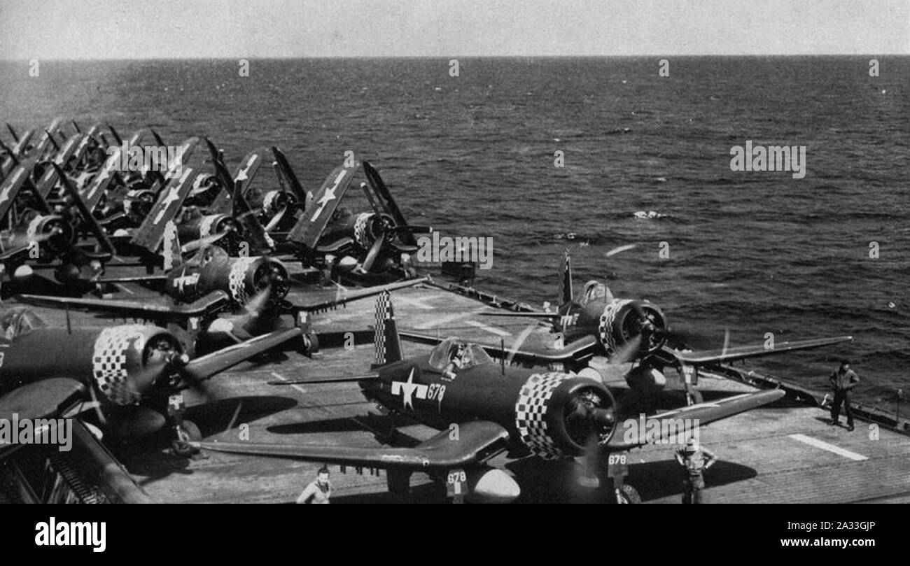 F4U Corsairs of VMF-312 aboard USS Hollandia (CVE-97), in April 1945 ...