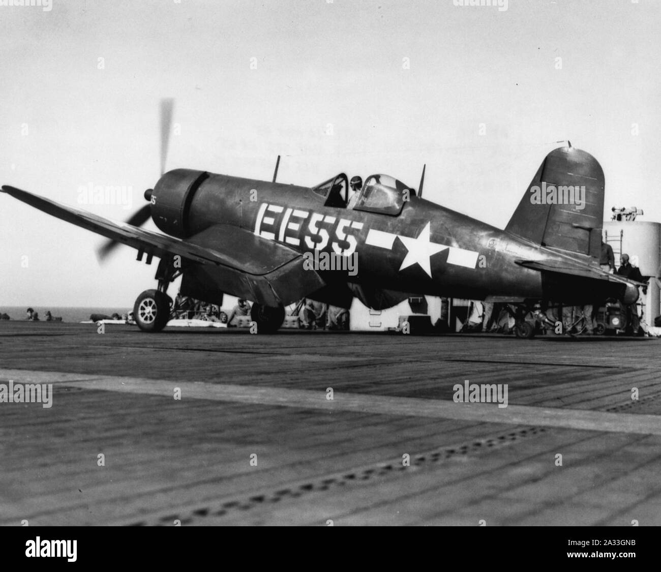 F4U-1D of VMF-512 on USS Gilbert Islands (CVE-107) in 1945. Stock Photo