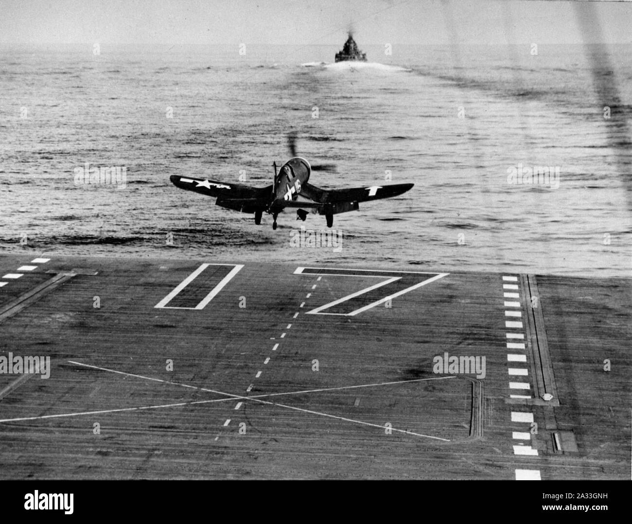 F4U-1D of VF-84 takes off from USS Bunker Hill (CV-17) in February 1944. Stock Photo
