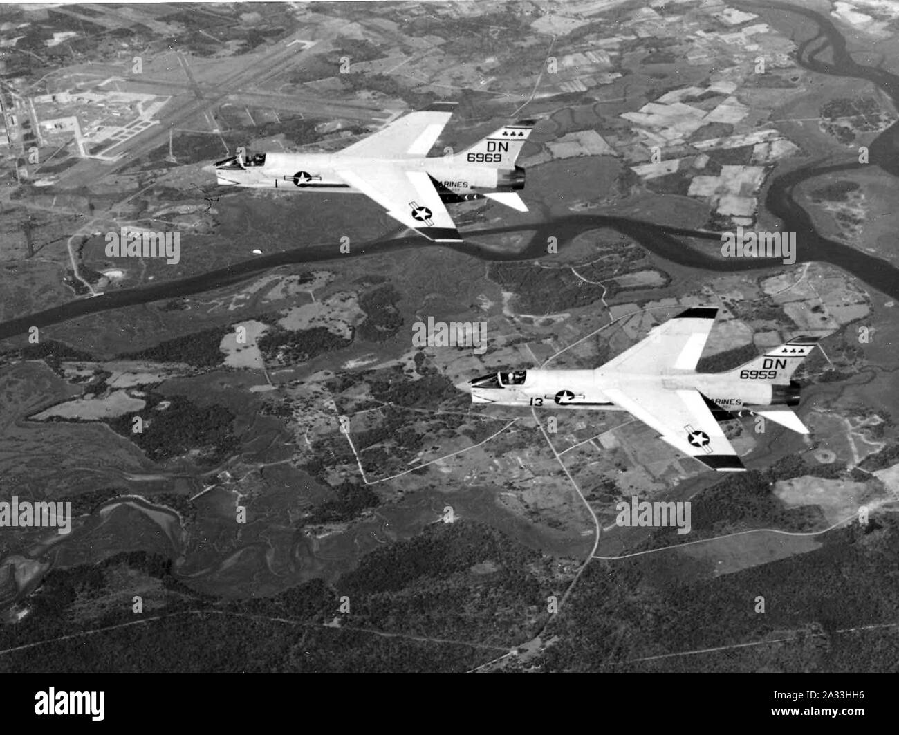 F8U-2 Crusaders of VMF-333 over MCAS Cherry Point c1958. Stock Photo