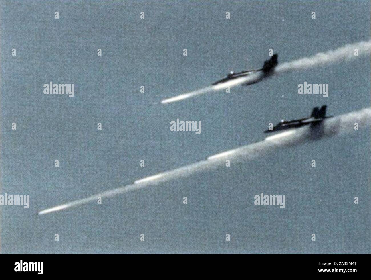 F-18C Hornets firing Zuni rockets in 1992. Stock Photo