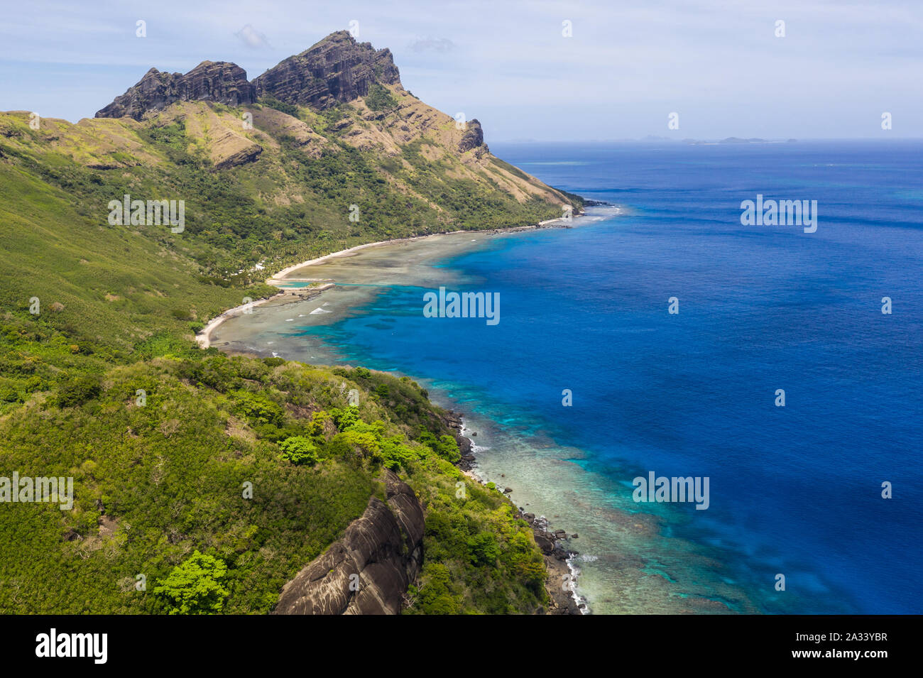 Wild coast of the tropical Waya island in the Yasawa islands group in Fiji in the south Pacific ocean. Stock Photo