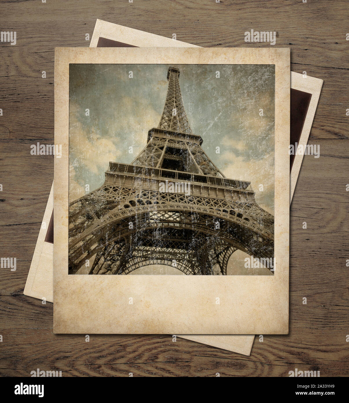 Vintage Eiffel tower instant photos on wood Stock Photo