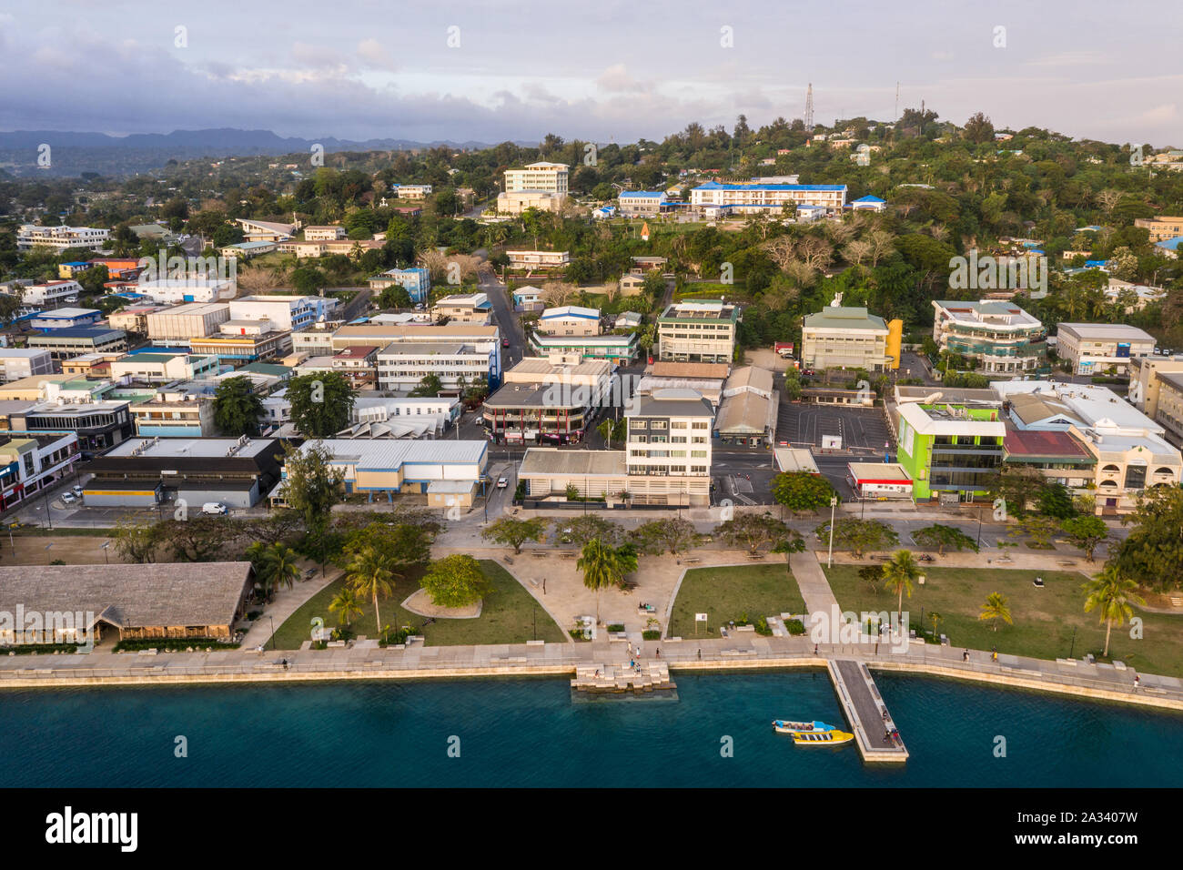Aerial view of Port Vila city center with the waterfront promenade and the seawall public park in Vanuatu capital city in the Pacific. Stock Photo