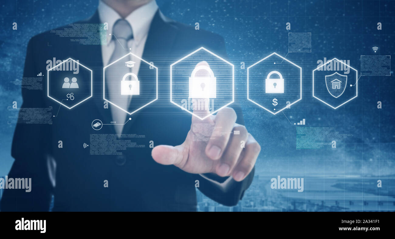 Businessman activate digital network and online data security system. Protection network and digital data Stock Photo