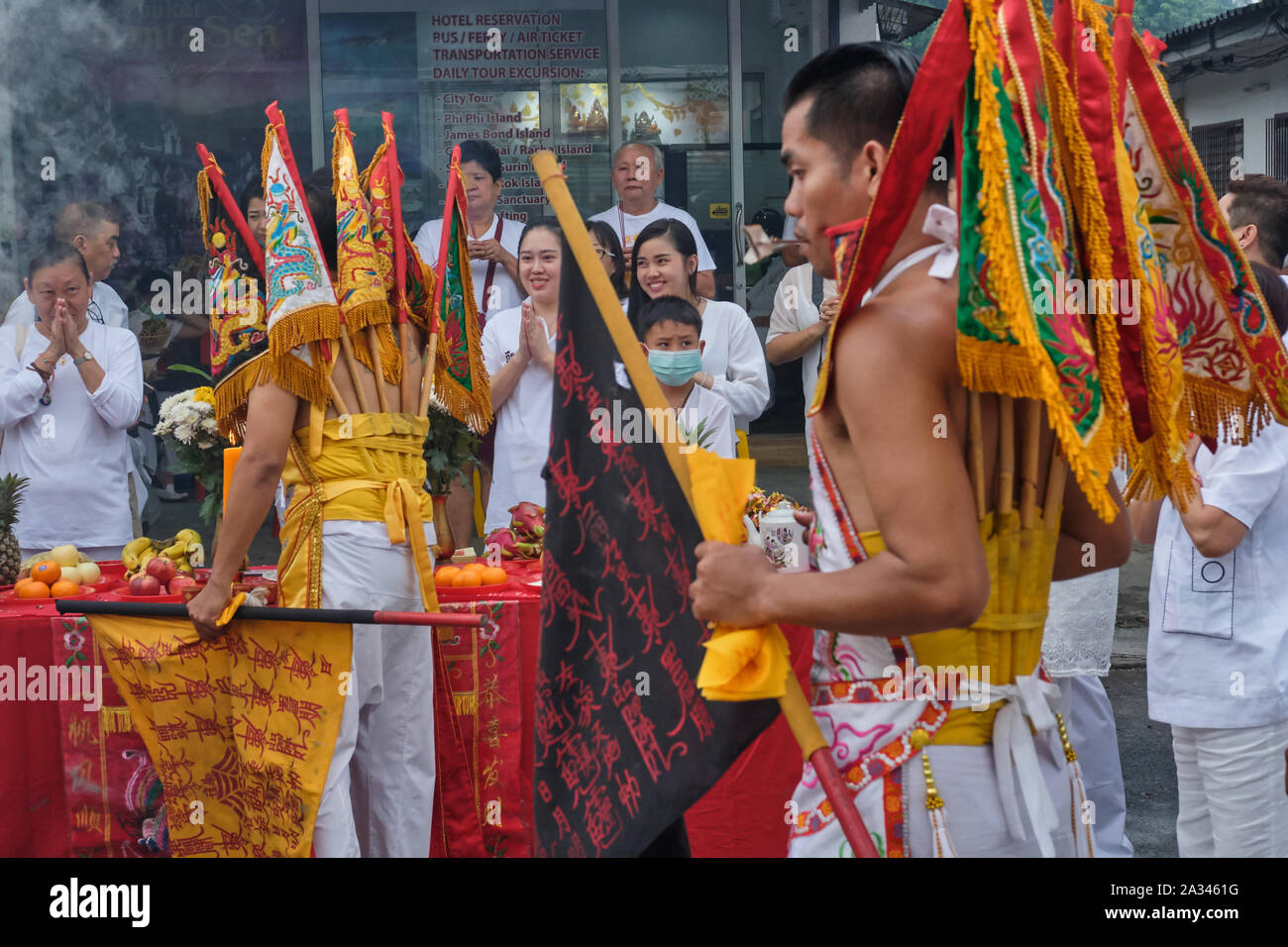Mah Song or spirit mediums decorated with sacred Chinese flags during